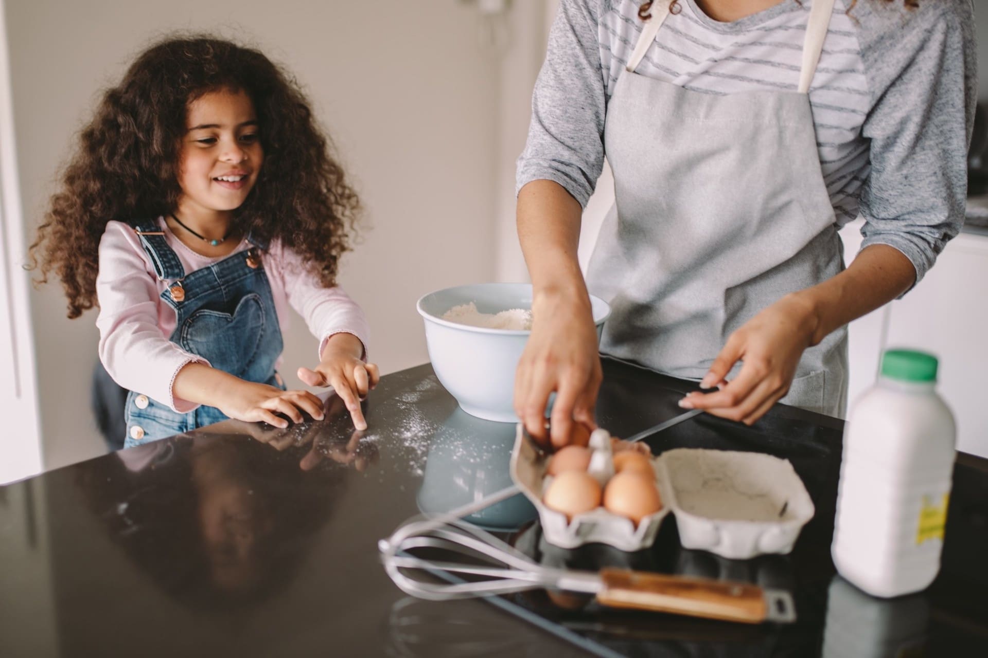10 fun Montessori-inspired ways to introduce cooking to your child mom and child cooking together