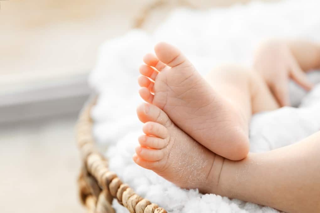 What you need to know about COVID-19 infant deaths newborn feet