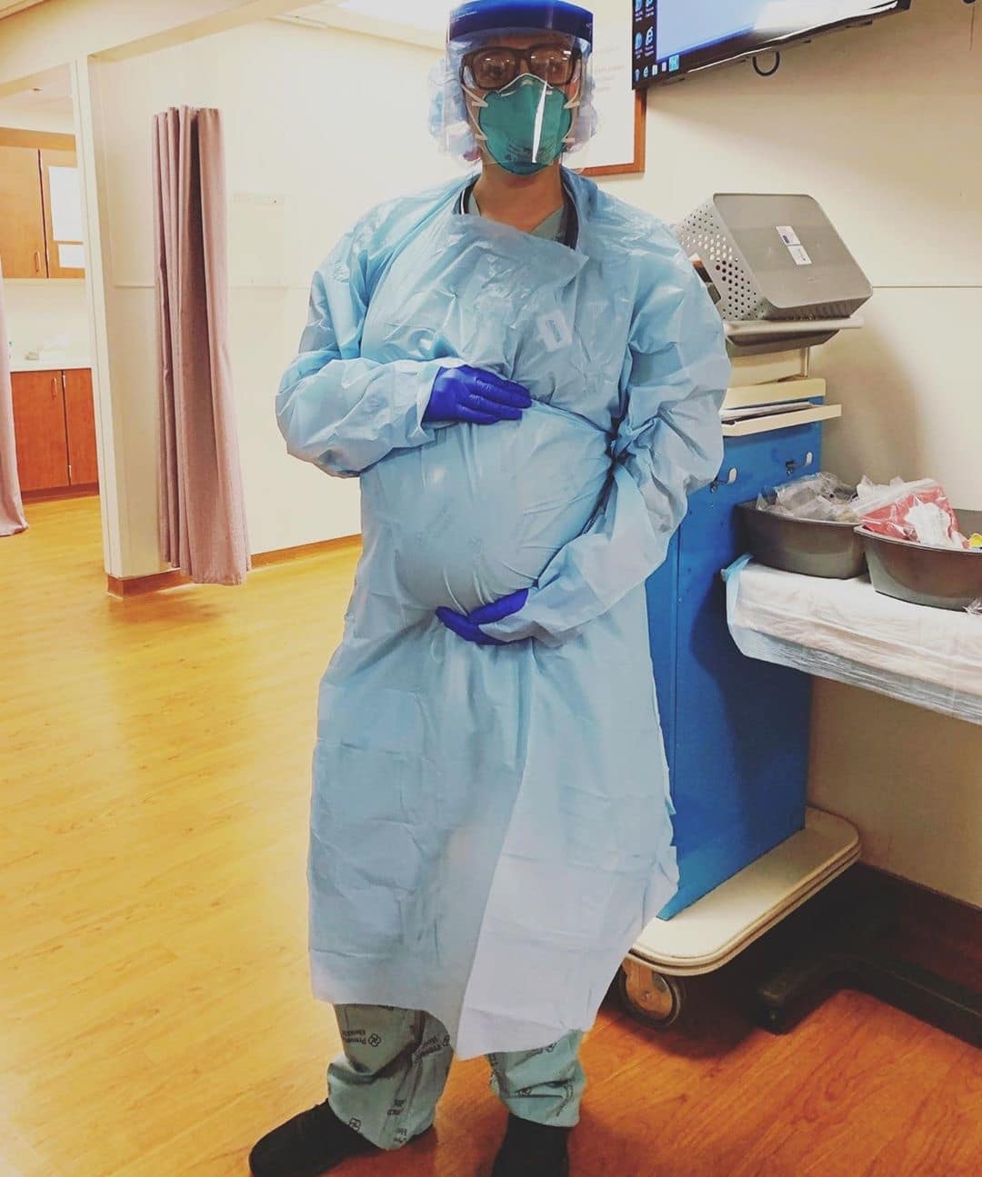 These viral bump photos from the front lines share an important message a front liner holding her baby bump