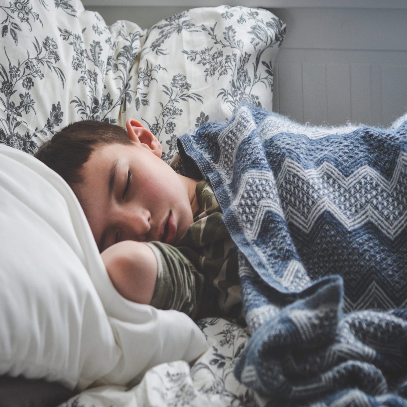 The unexpected COVID-19 symptom parents need to know about child sleeping on the couch