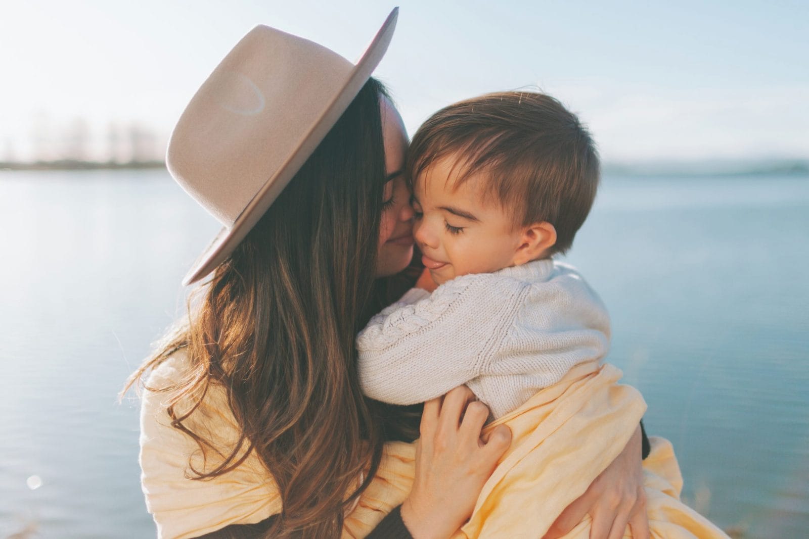 When this is over, my baby mom kissing toddler boy on the head