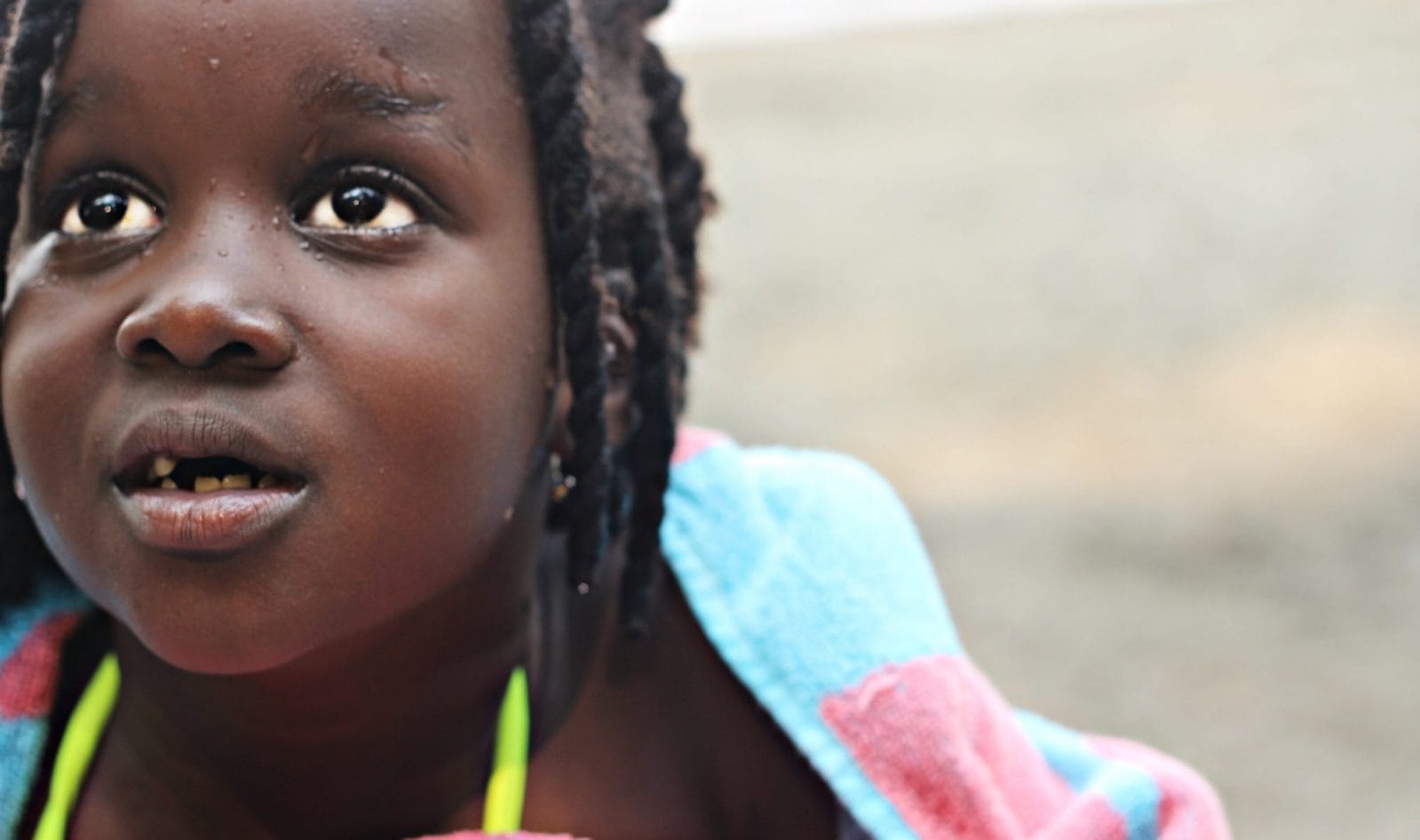 5 phrases to help young kids understand the protests for racial justice little girl looking up