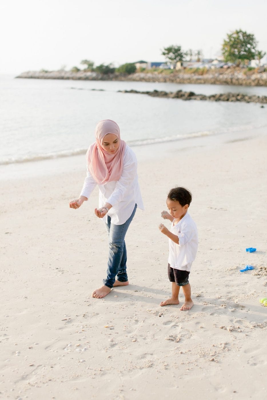 Our family has been apart for 13 weeks—here’s what we learned about parenting mom and son playing on the beach