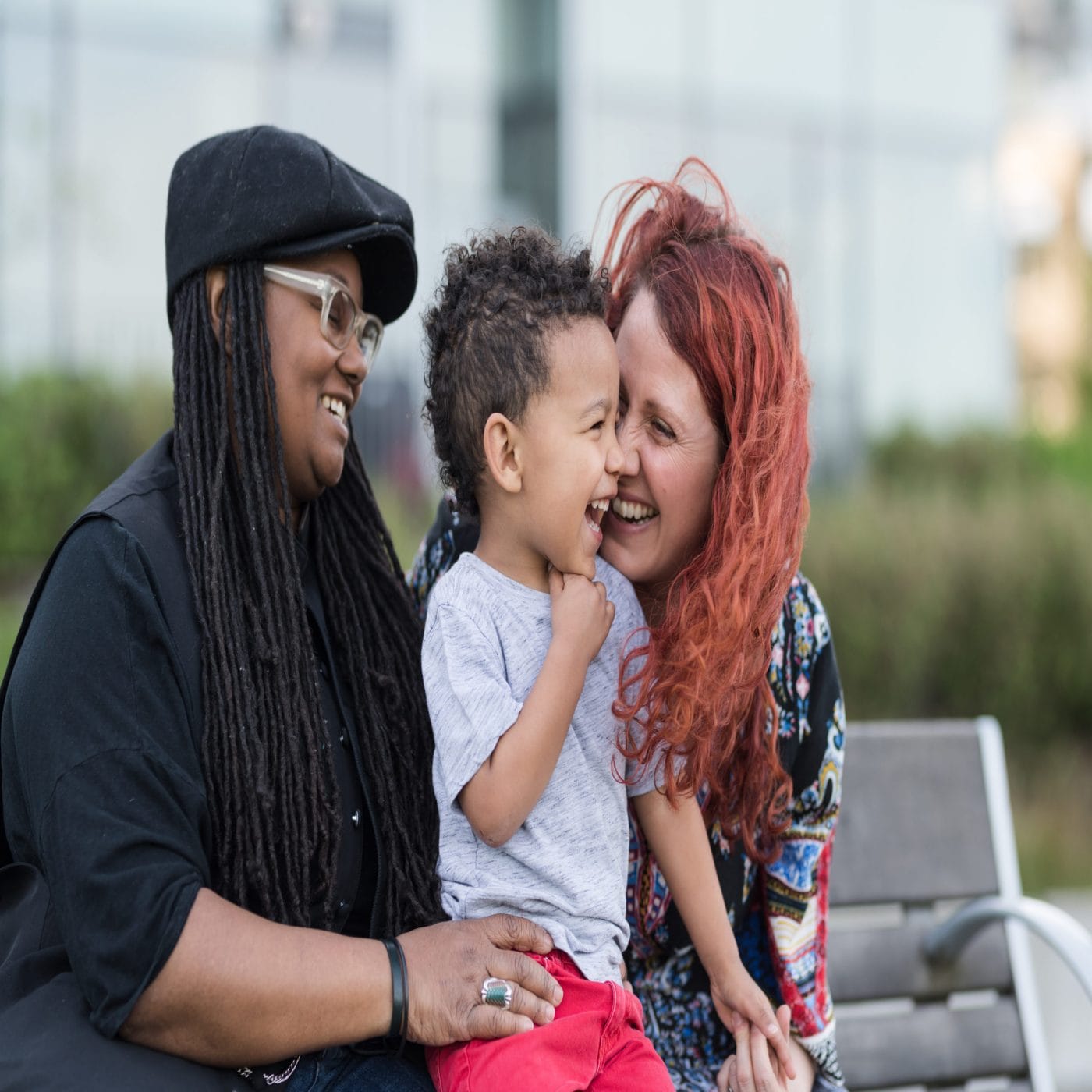 A new supreme court ruling protects LGBTQ+ employees two moms snuggling toddler