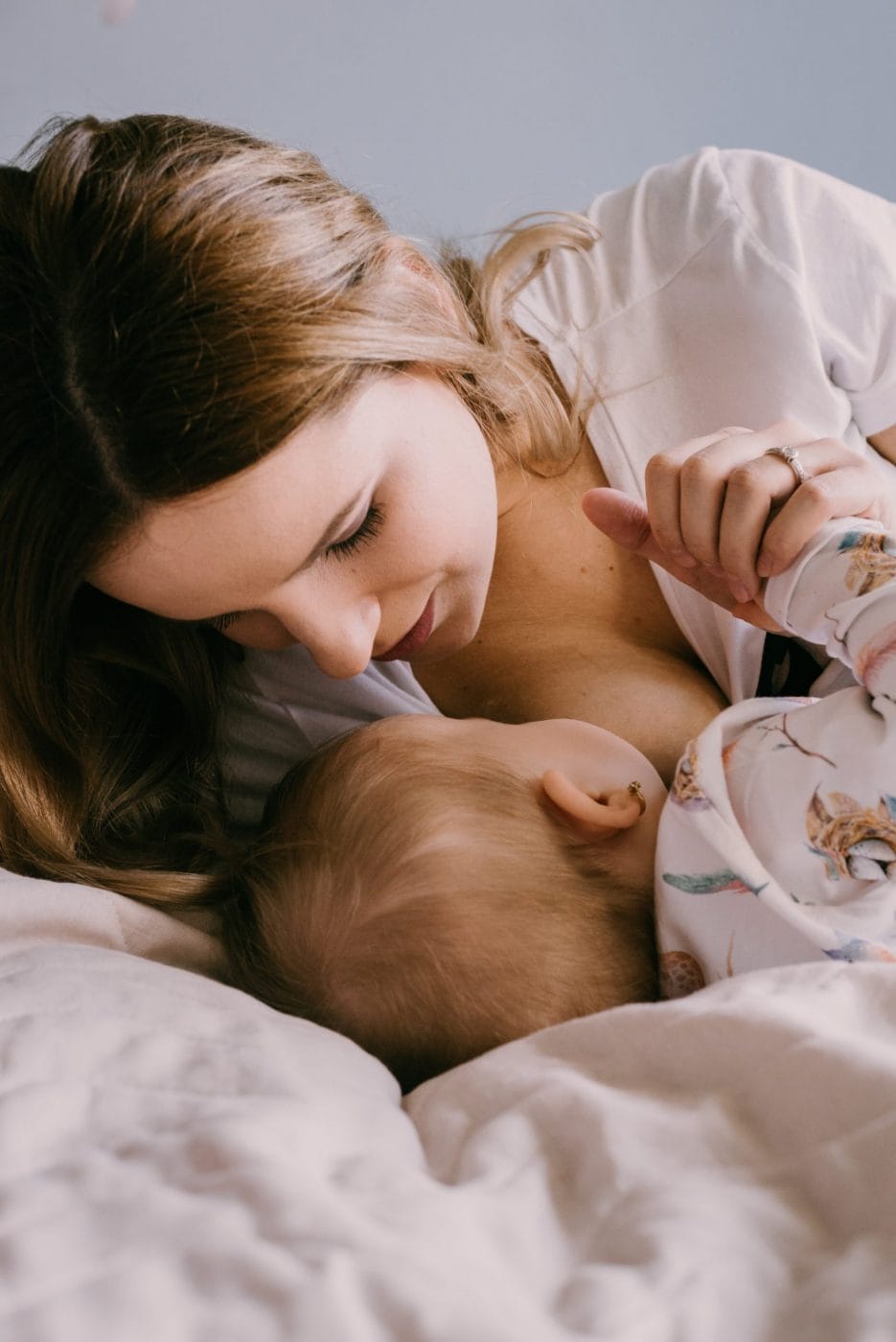 COVID-19 has made moms even more committed to breastfeeding, says new survey woman breastfeeding baby