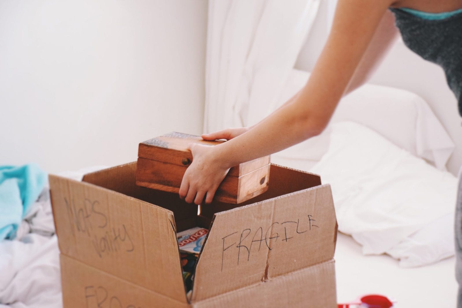 Why we moved our entire family in the middle of the pandemic woman packing a moving box