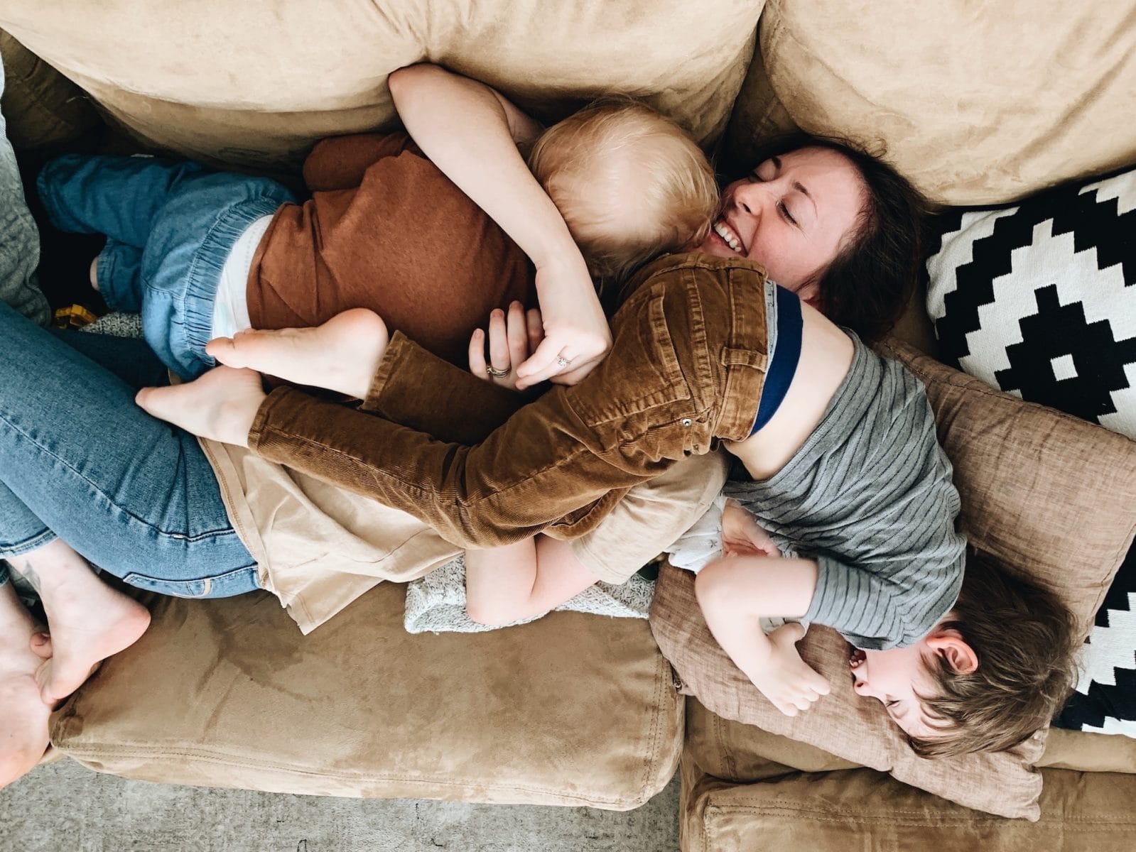 How to set loving limits that actually work mom hugging kid on couch