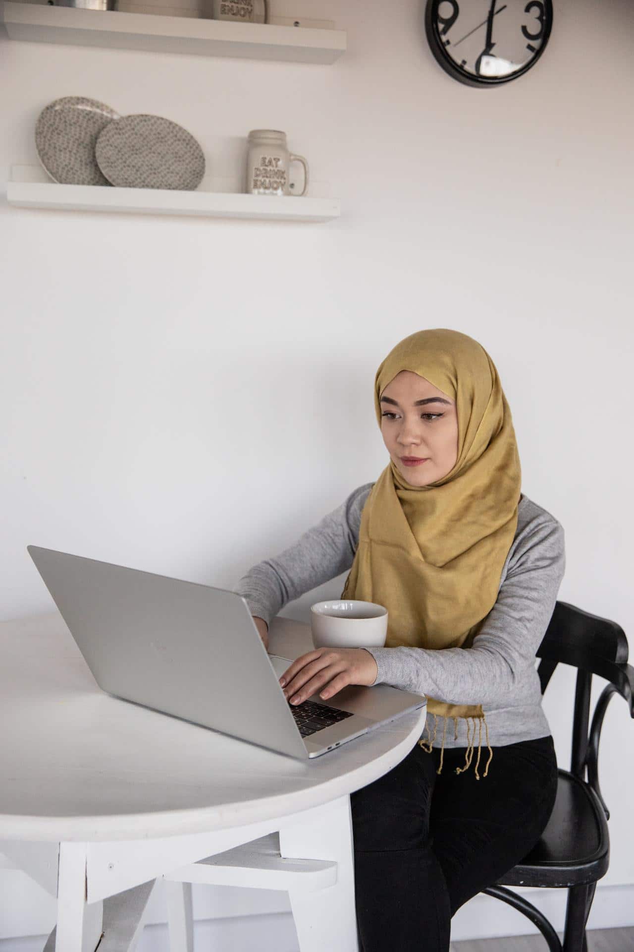 12 ways to make your LinkedIn profile shine woman working on a laptop