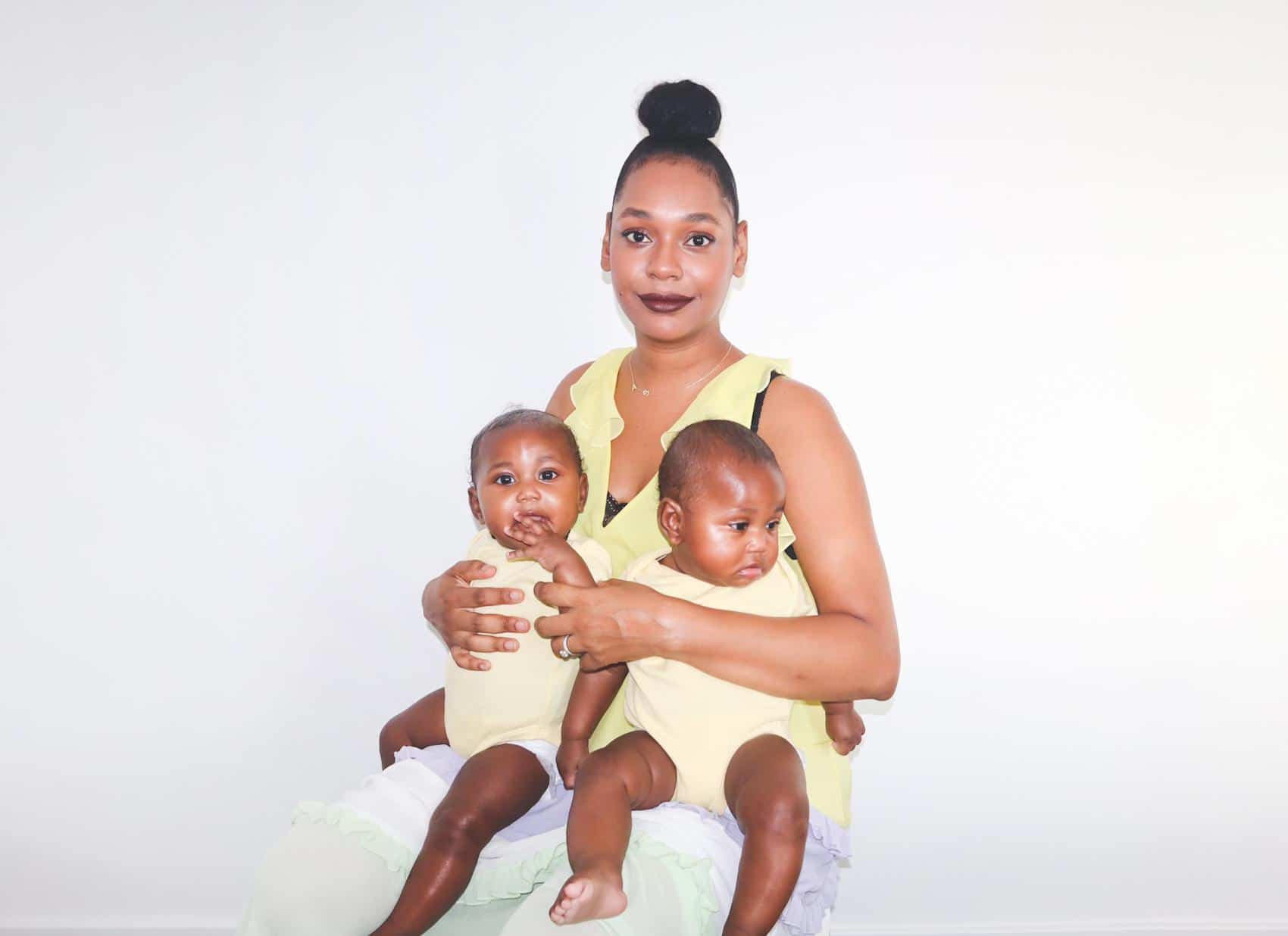 A letter to my daughters for Black History Month zara oteng with her daughters on her lap- letter to my daughter
