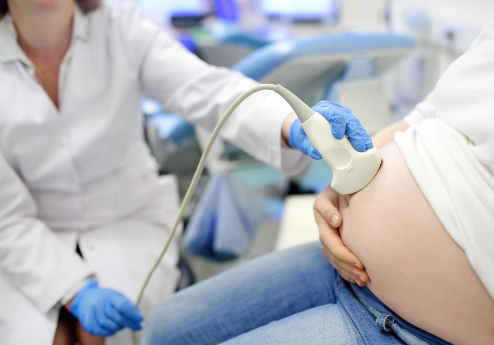 Pfizer is launching a COVID-19 vaccine trial for pregnant women woman getting an ultrasound
