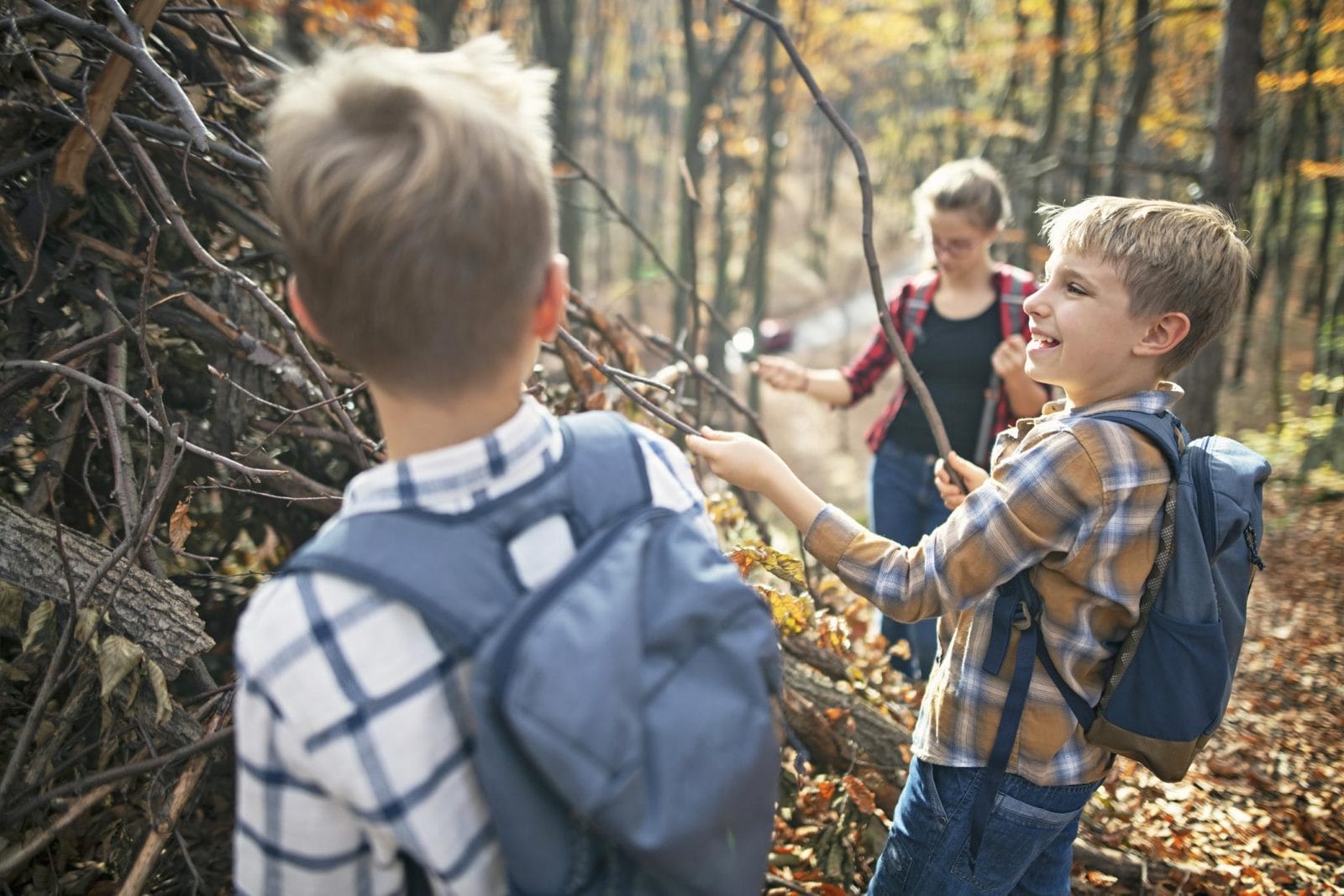 ‘Forest kindergarten’ gets kids outside and into nature kids playing in the woods - forest kindergarten