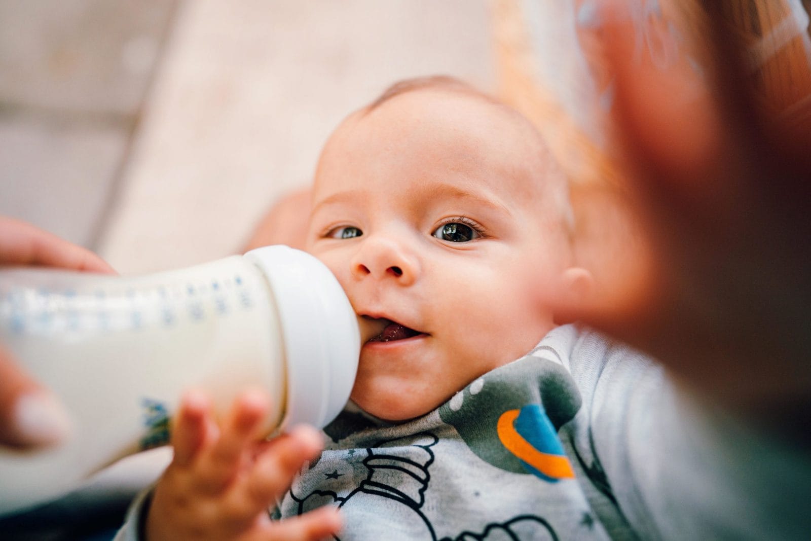 6 lies I believed about pumping before I had to exclusively pump Baby drinking from a bottle