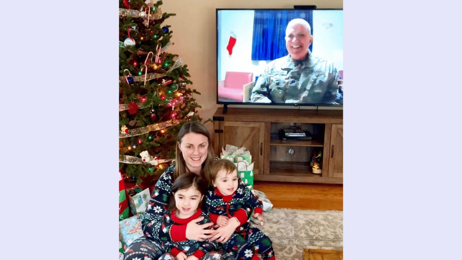 This toddler hugging a photo of her deployed dad reminds us of the sacrifices made by military kids