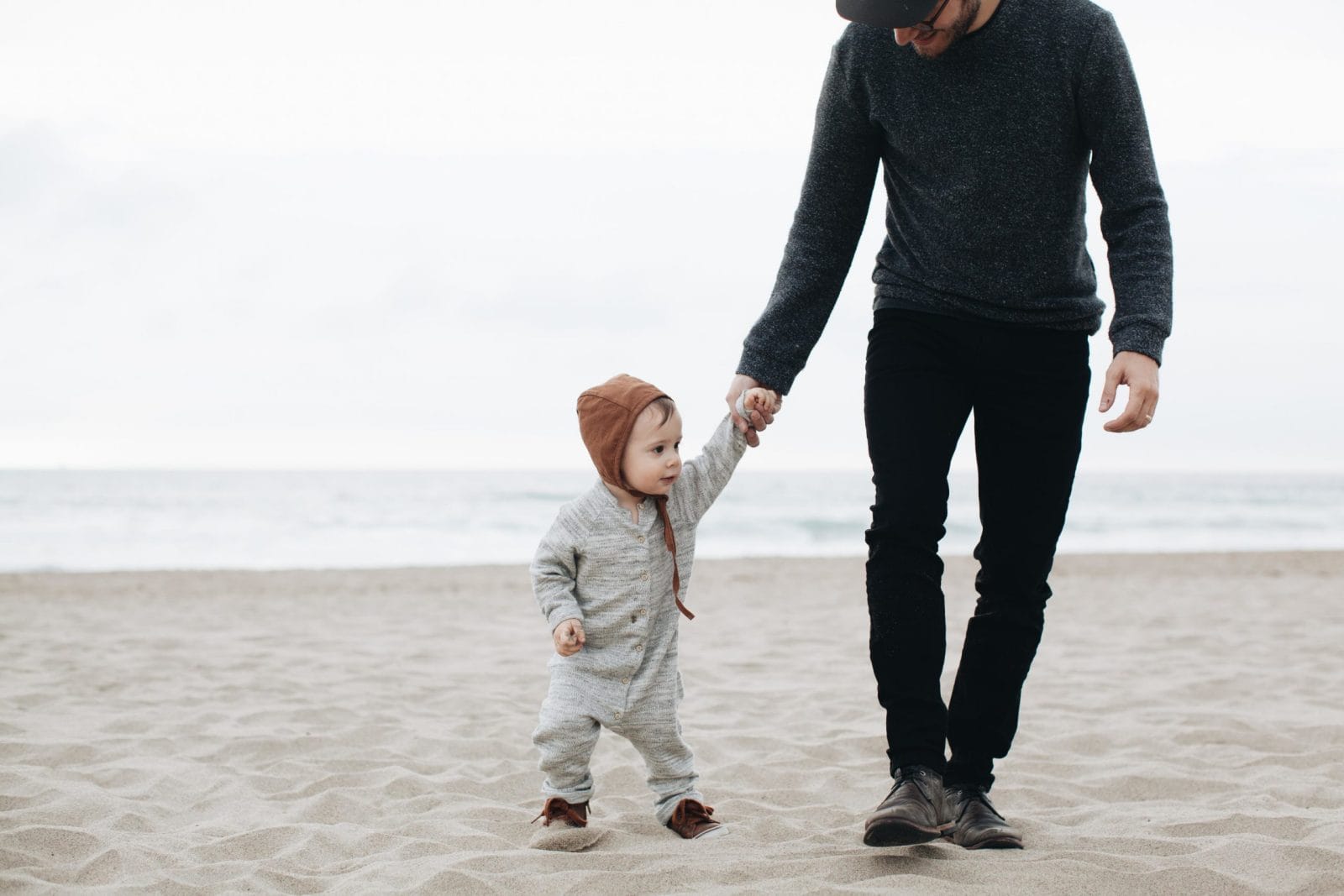 Traveling with kids is about to get easier, thanks to Google Maps mom walking with child on beach