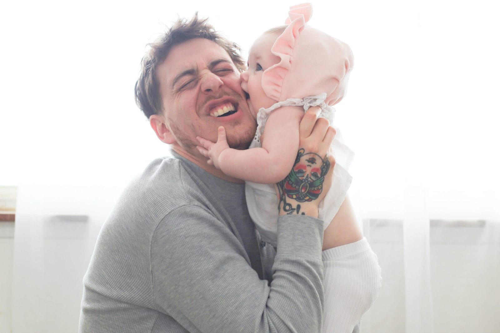 My husband parents totally different from me baby kissing dad on the cheek