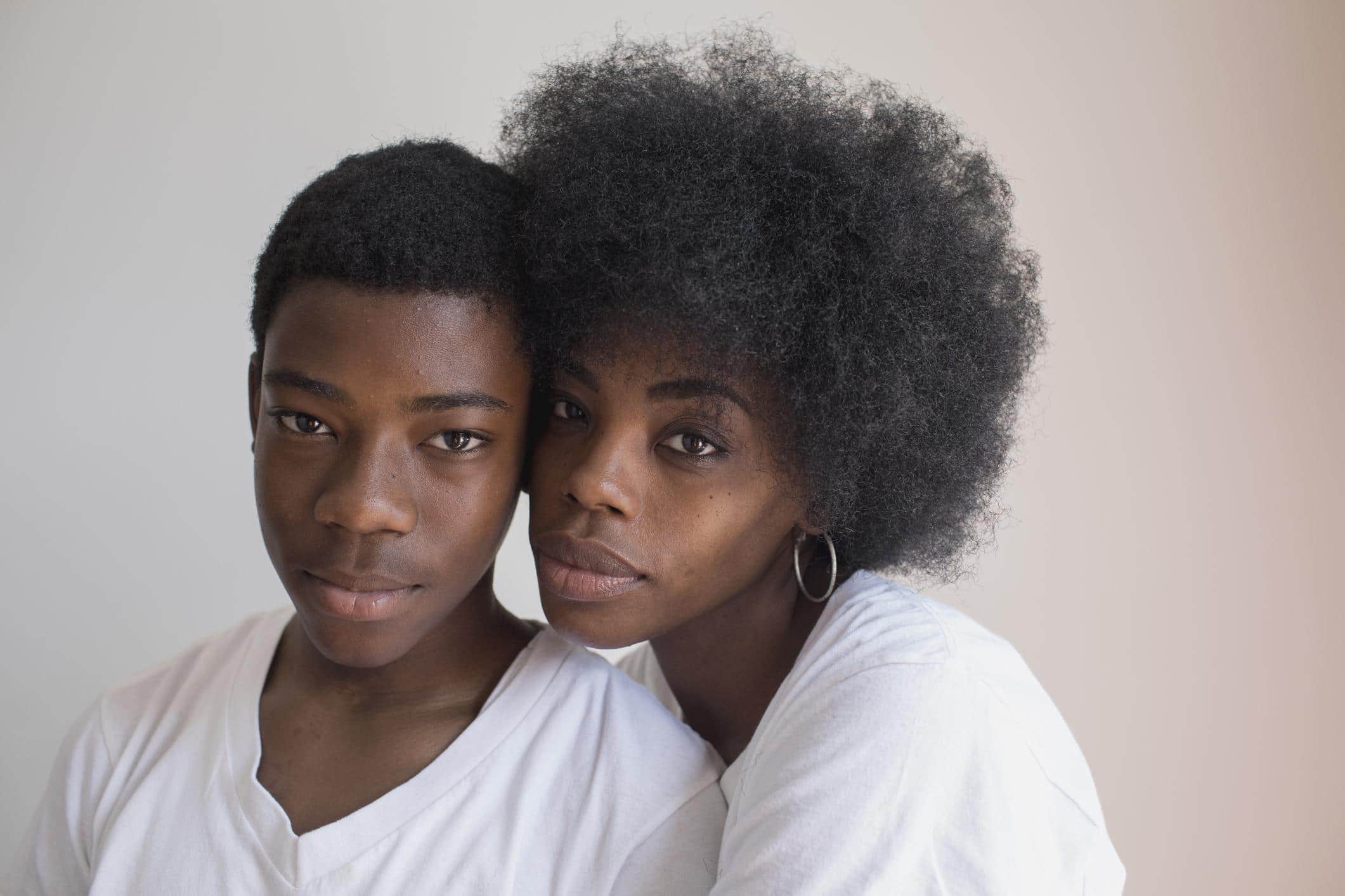 How (and why) to talk to your kids about Juneteenth black couple posing together- how to talk about juneteenth