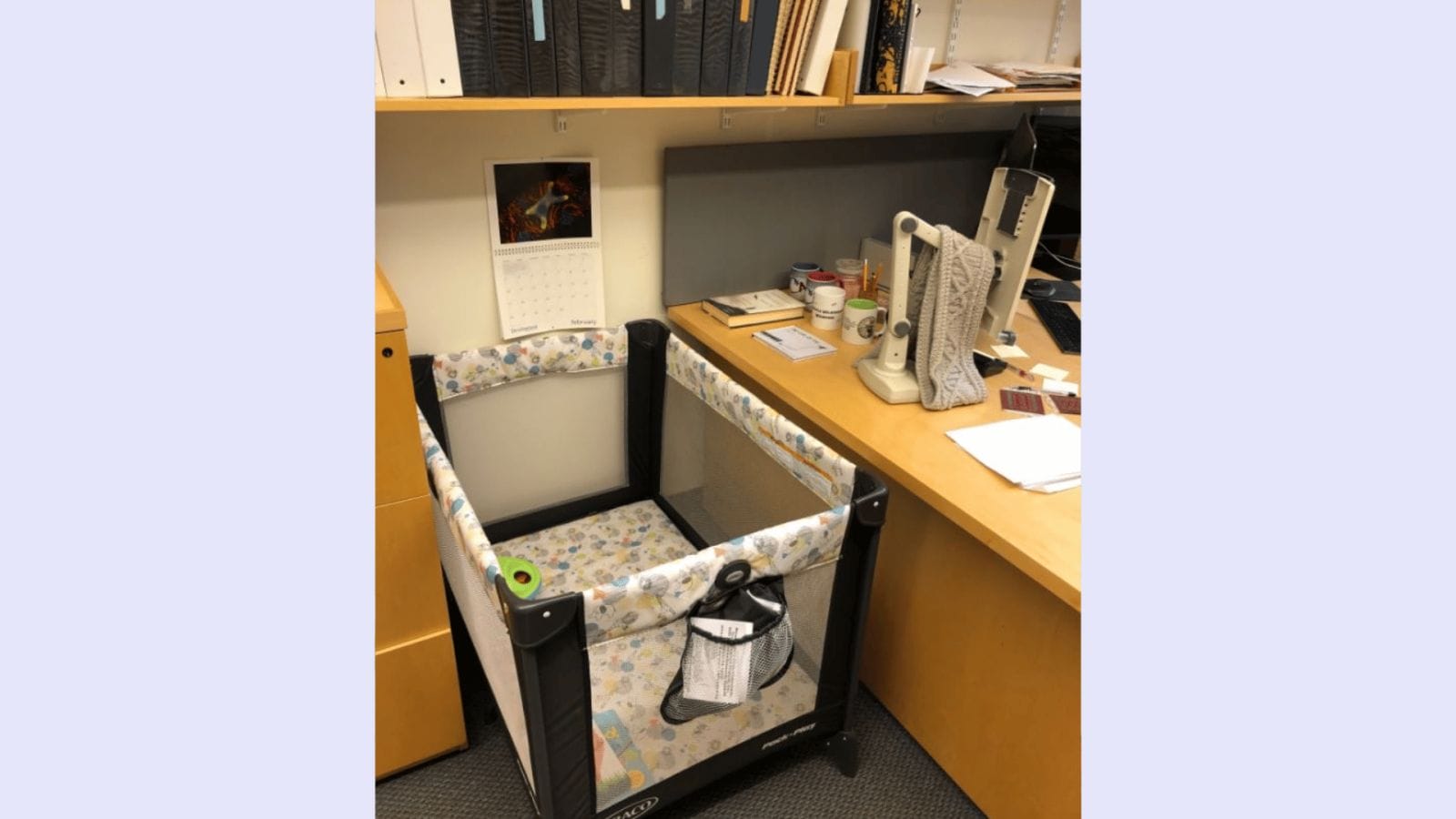 Viral photo shows the perfect way this professor supports his students who are moms pack n play set up in an office