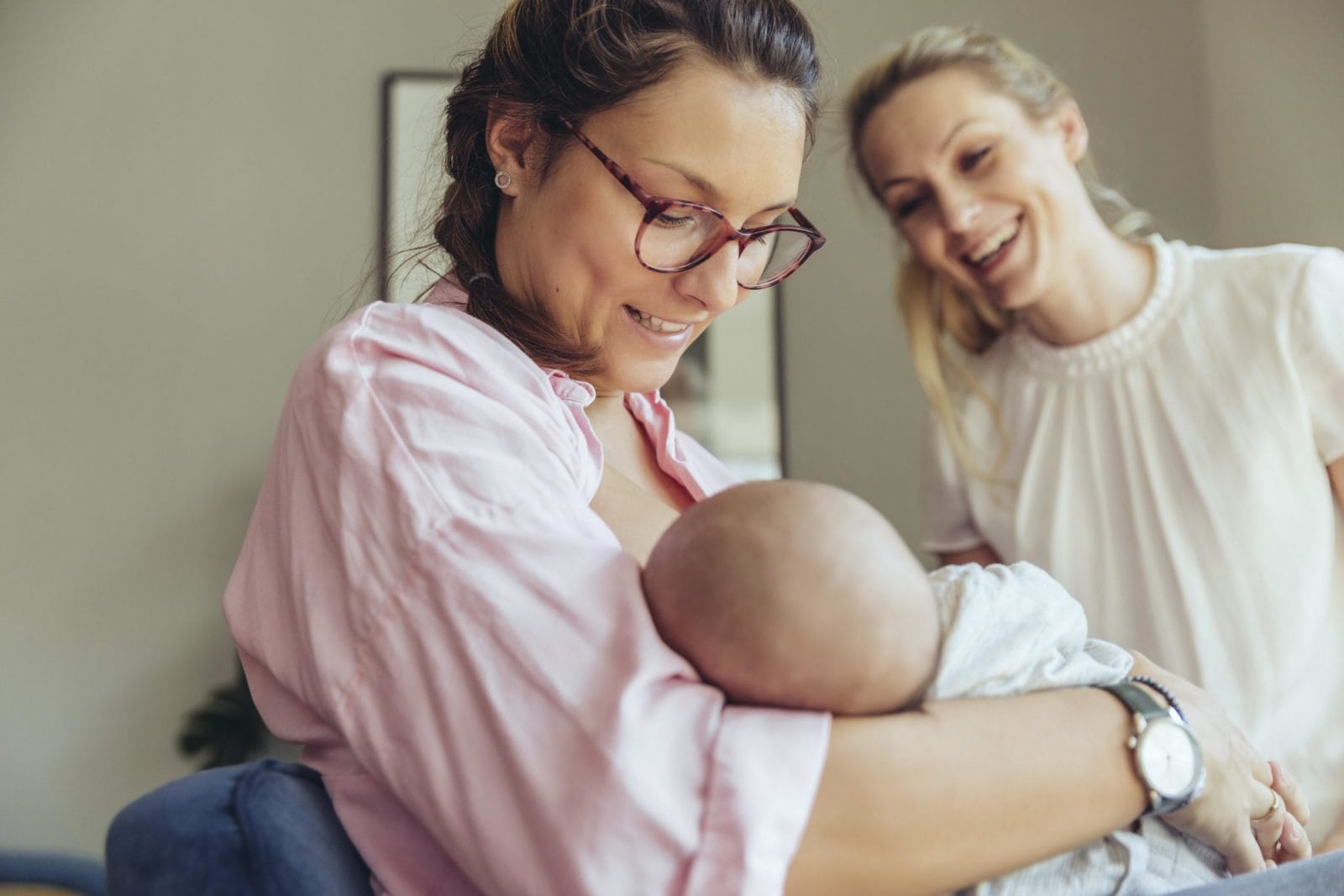 What is a midwife? Here’s how they’re different from OBs and doulas midwife holds baby after birth - what is a midwife?