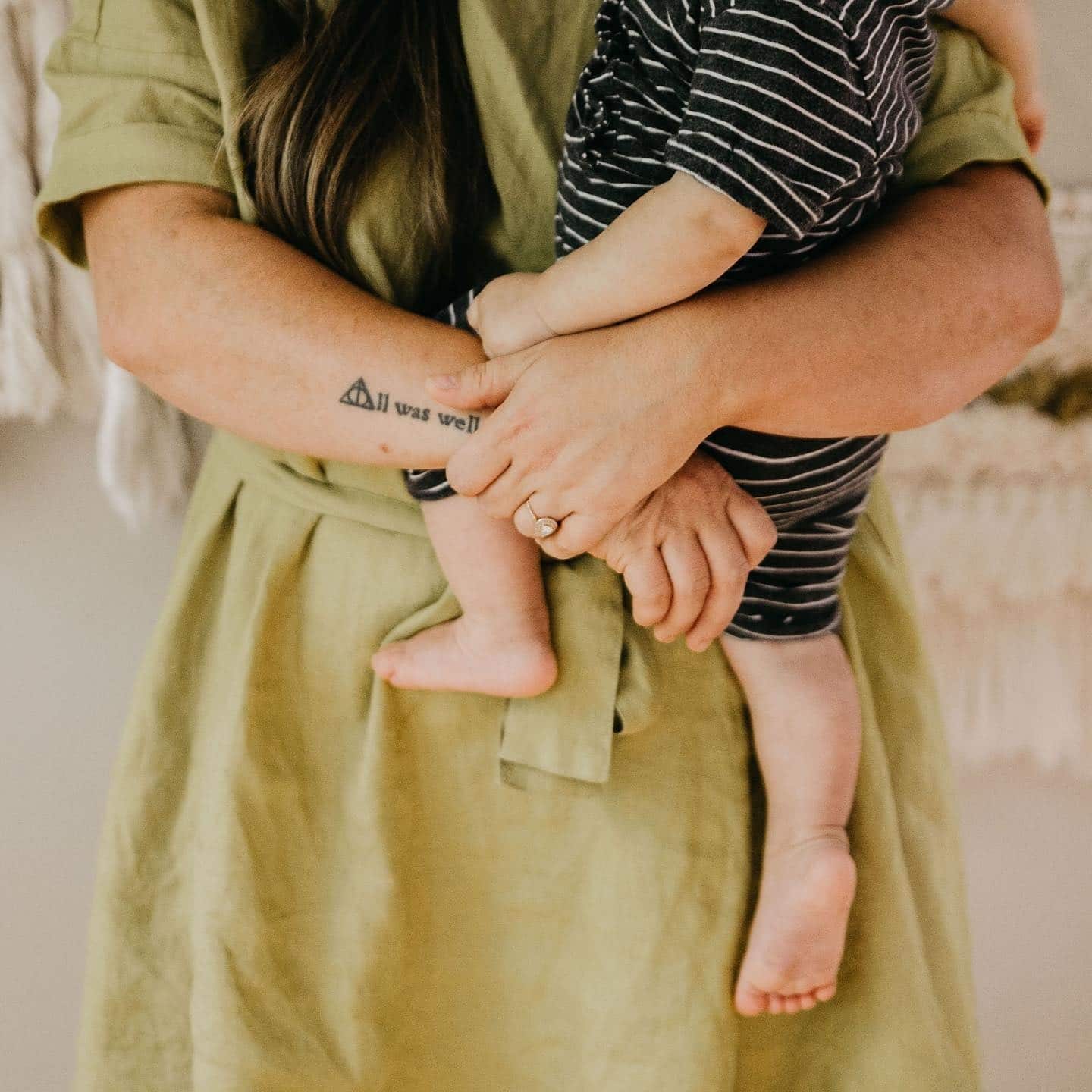 This grieving mama has some important advice for other parents mom holding toddler