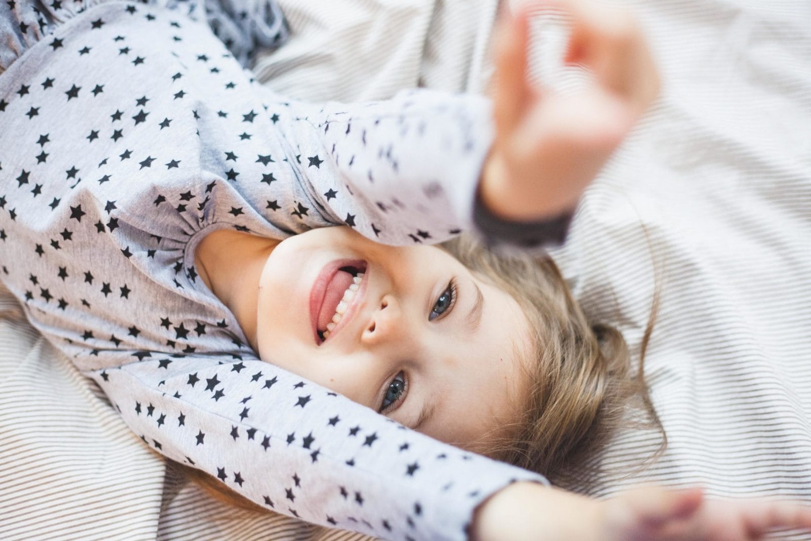 Here’s how to raise kids who tell the truth, according to science little girl playing - how to encourage honest behavior