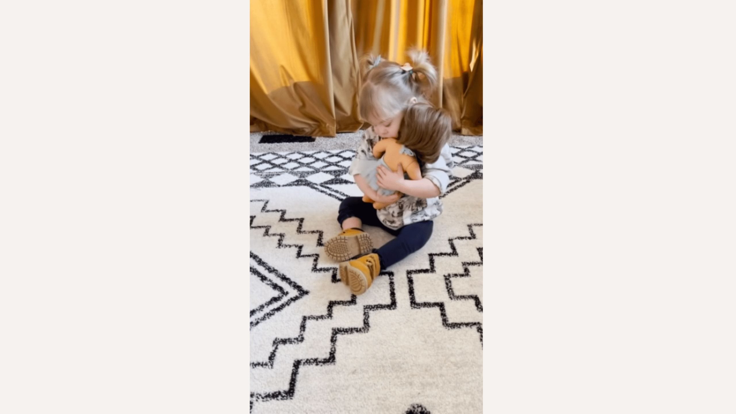 This little girl with Down Syndrome has the sweetest reaction when she holds a doll that looks just like her origin 707 - Motherly
