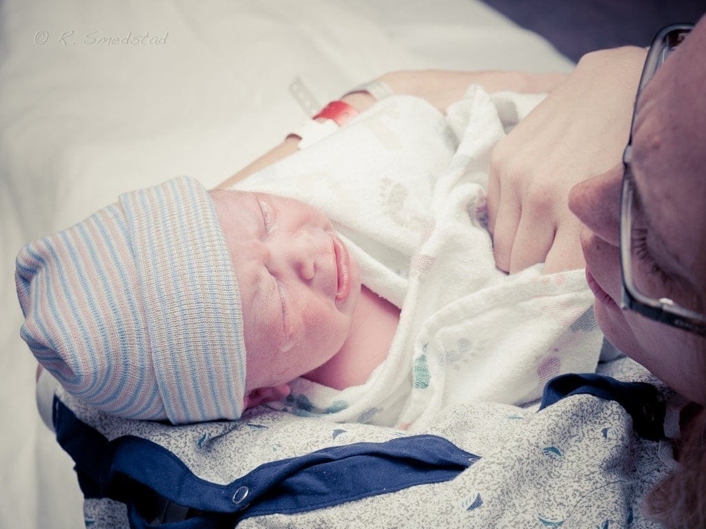 When I tell you about my difficult birth, here’s what I need you to do mom holding newborn baby after birth