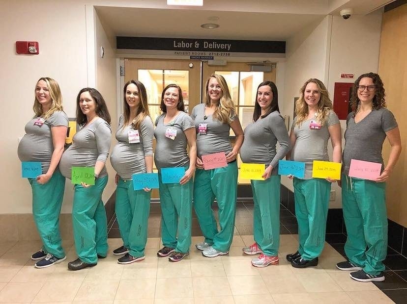 Those pregnant nurses who went viral have all given birth + the photo of the babies is 😍 pregnant nurses standing together holding their due dates in front of them