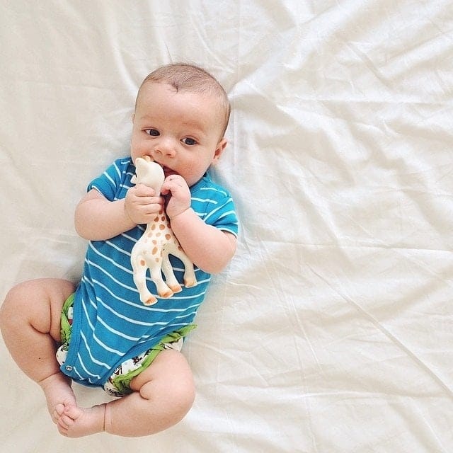 Activities for a 2-month-old: Fostering baby’s development baby playing with Sophie