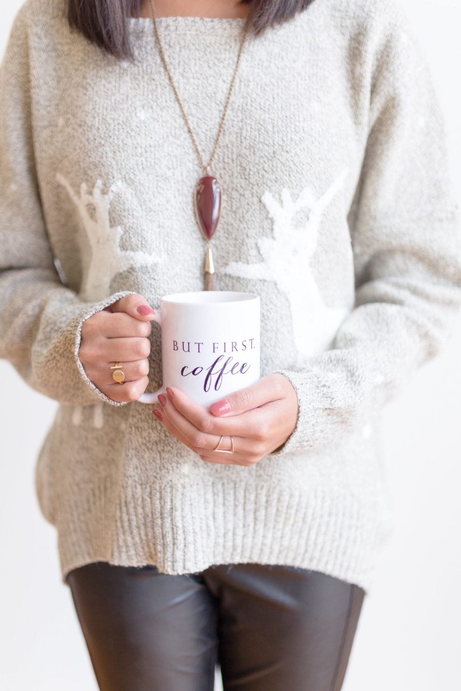 Even a little coffee during pregnancy can impact your baby’s birth weight, says study woman holding a cup of coffee