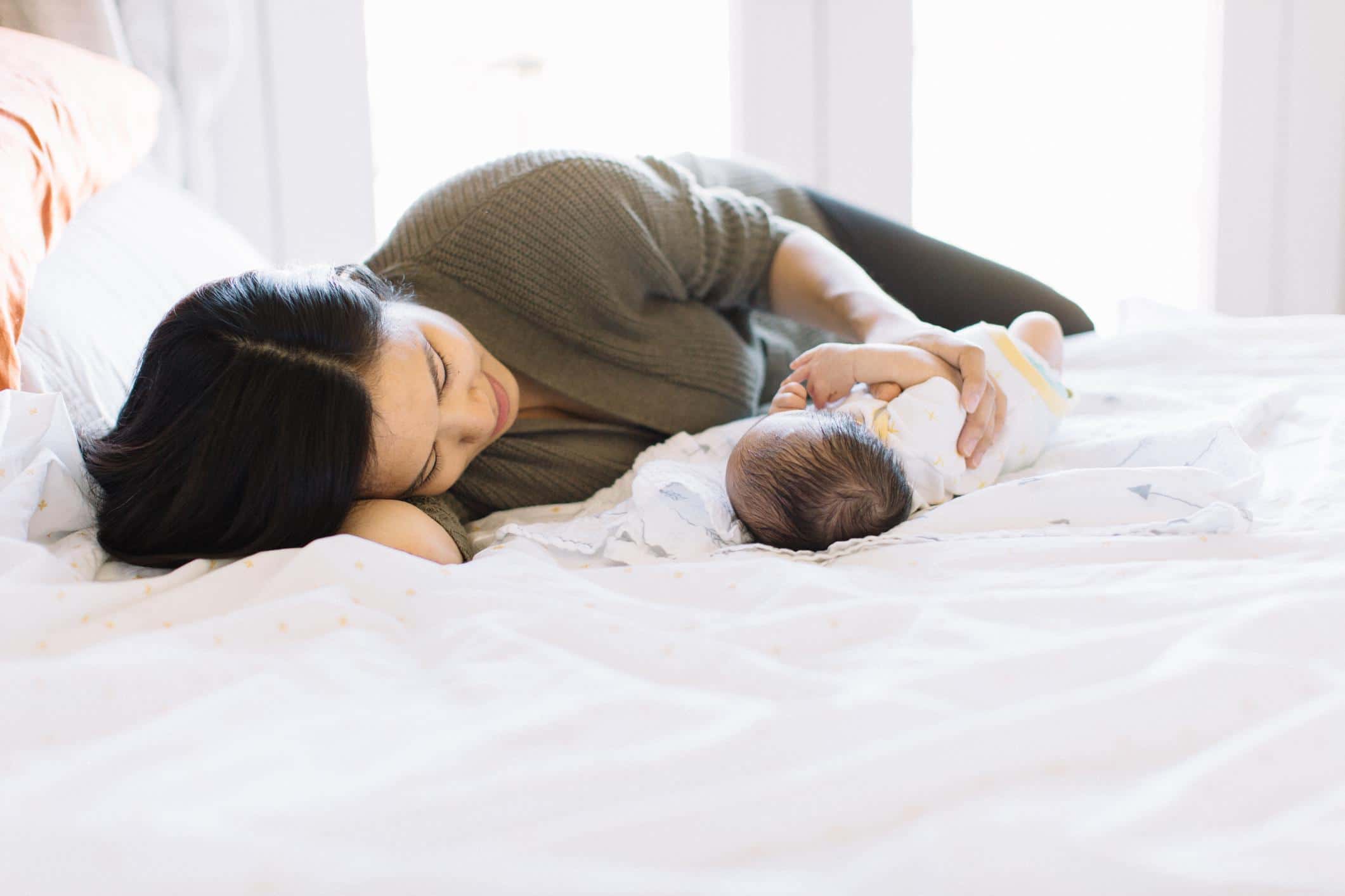 I was going to fold the clothes, but instead I held you mom laying in bed with baby