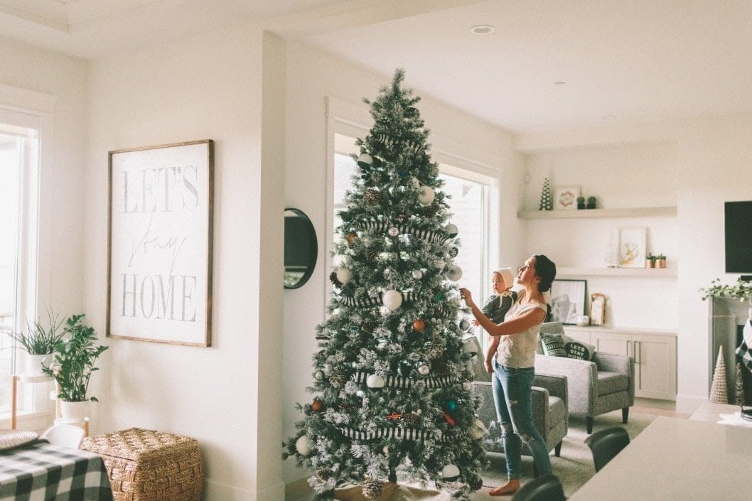 We took Christmas morning and reserved it just for us mom showing baby christmas tree