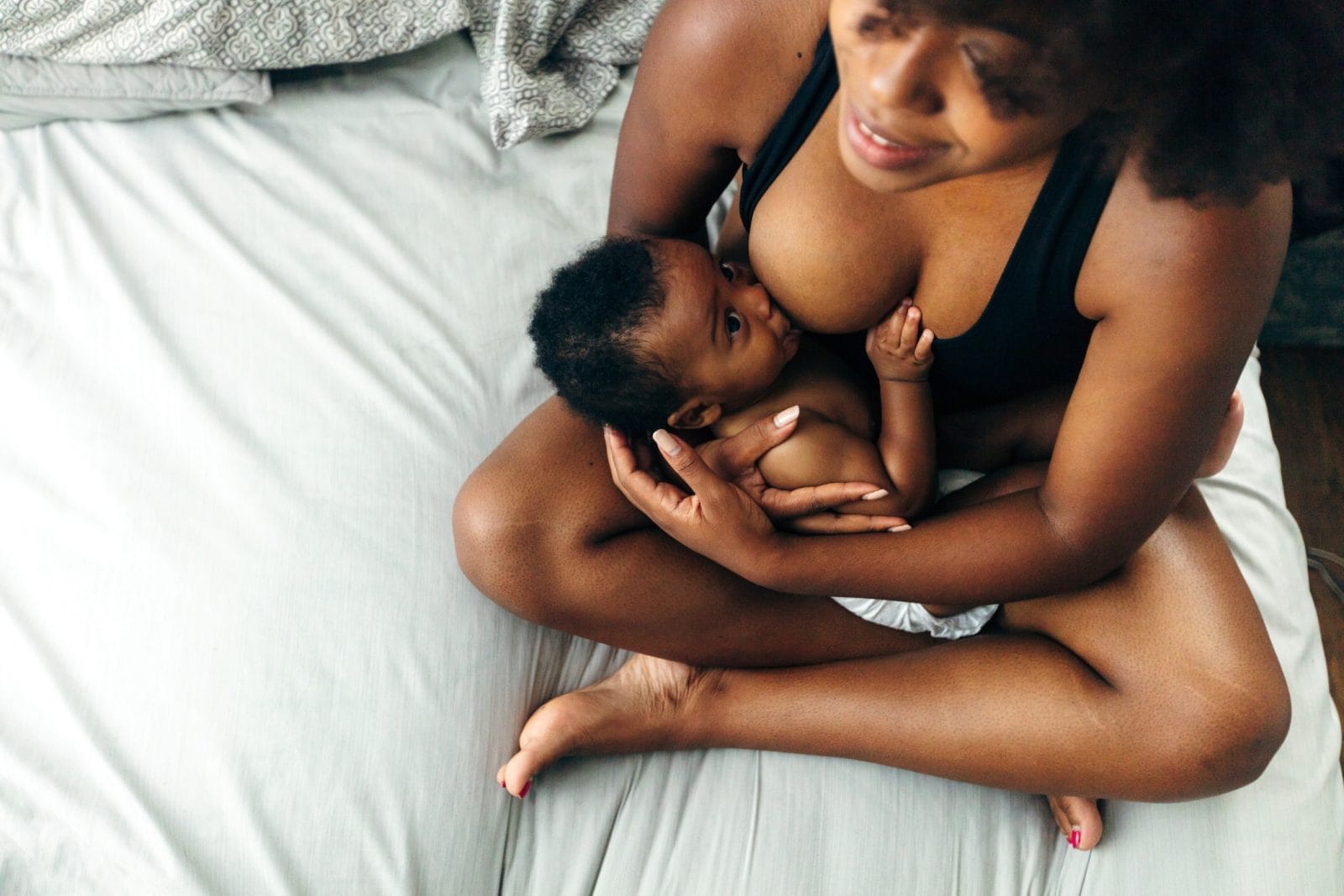A love letter to my boobs woman breastfeeding baby