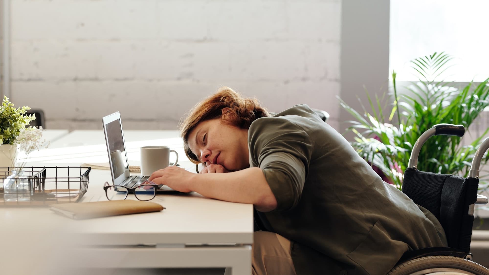 It’s science: You’re so exhausted because your ‘surge capacity’ is depleted woman asleep on the desk