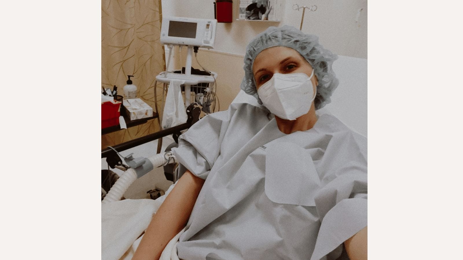 Katrina Scott walks Sports Illustrated runway in the middle of IVF cycle woman in hospital undergoing IVF treatment