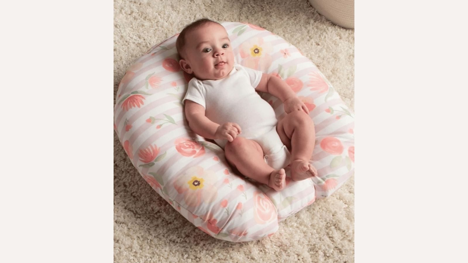 Boppy’s newborn lounger linked to at least 10 infant deaths—2 years after recall Baby sitting in a boppy