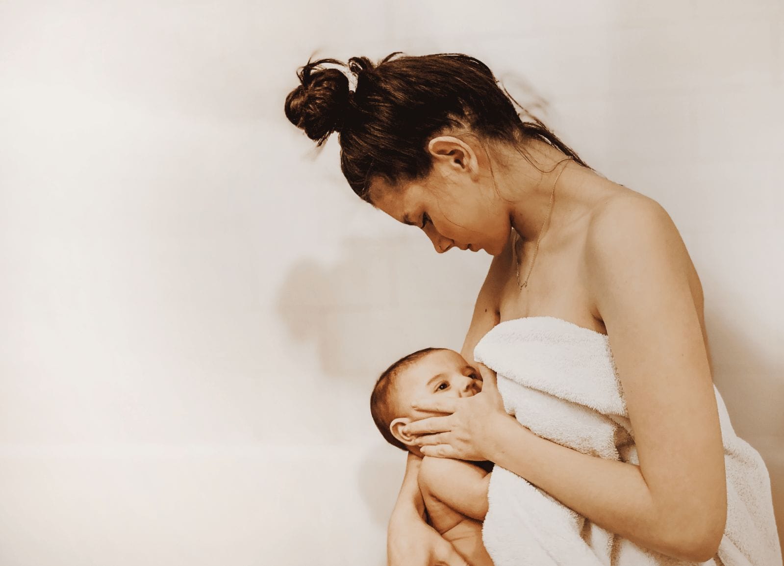 Mothers are the ultimate ‘essential workers’ mom nursing baby