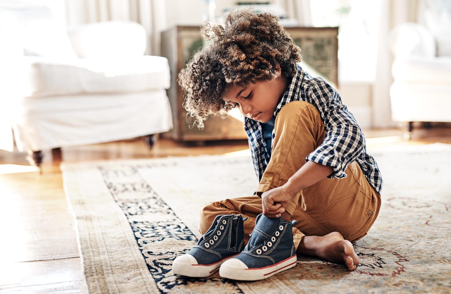 10 phrases to avoid if you want to raise a resilient child little boy putting on shoes