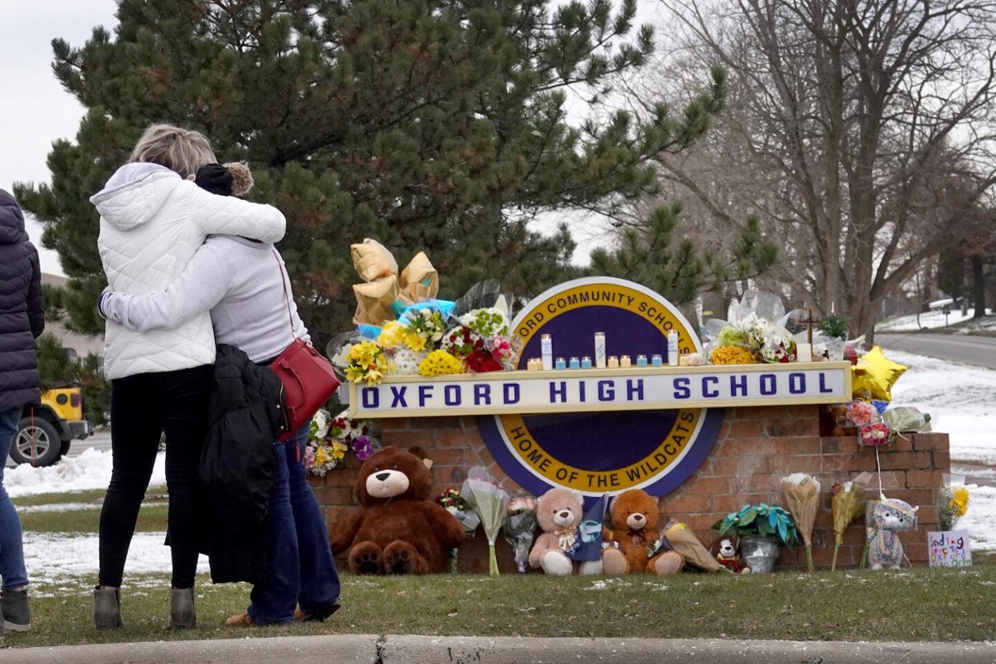 Parents of Michigan shooting suspect charged with involuntary manslaughter People mourning at Oxford High School