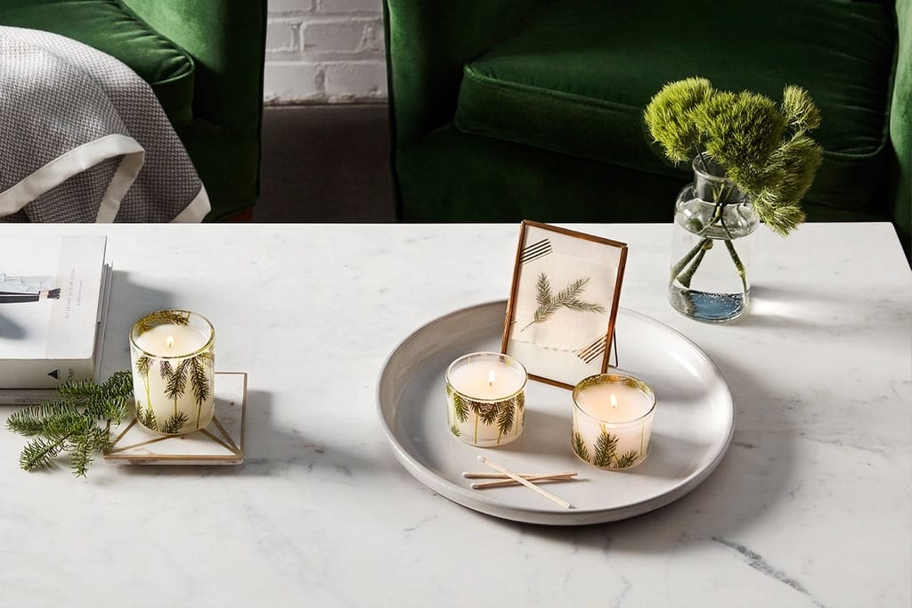We swear this pine-scented candle is Christmas magic in a jar Thymes frasier fir candles