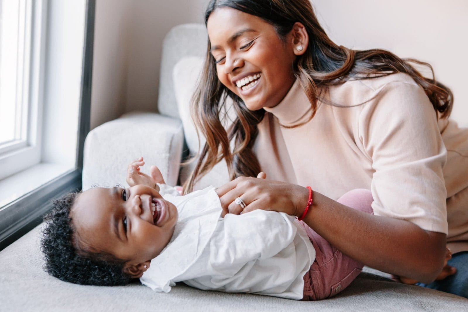 7 signs you are ready for another baby mom and young son laughing together