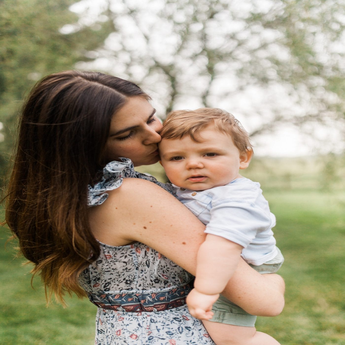 The pandemic robbed me of my dream for another baby pandemic birth decline: mother kissing baby's head