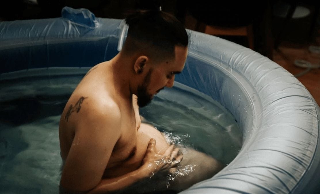 These photos from a trans father’s home birth are stunning 😍 non-binary person water birth