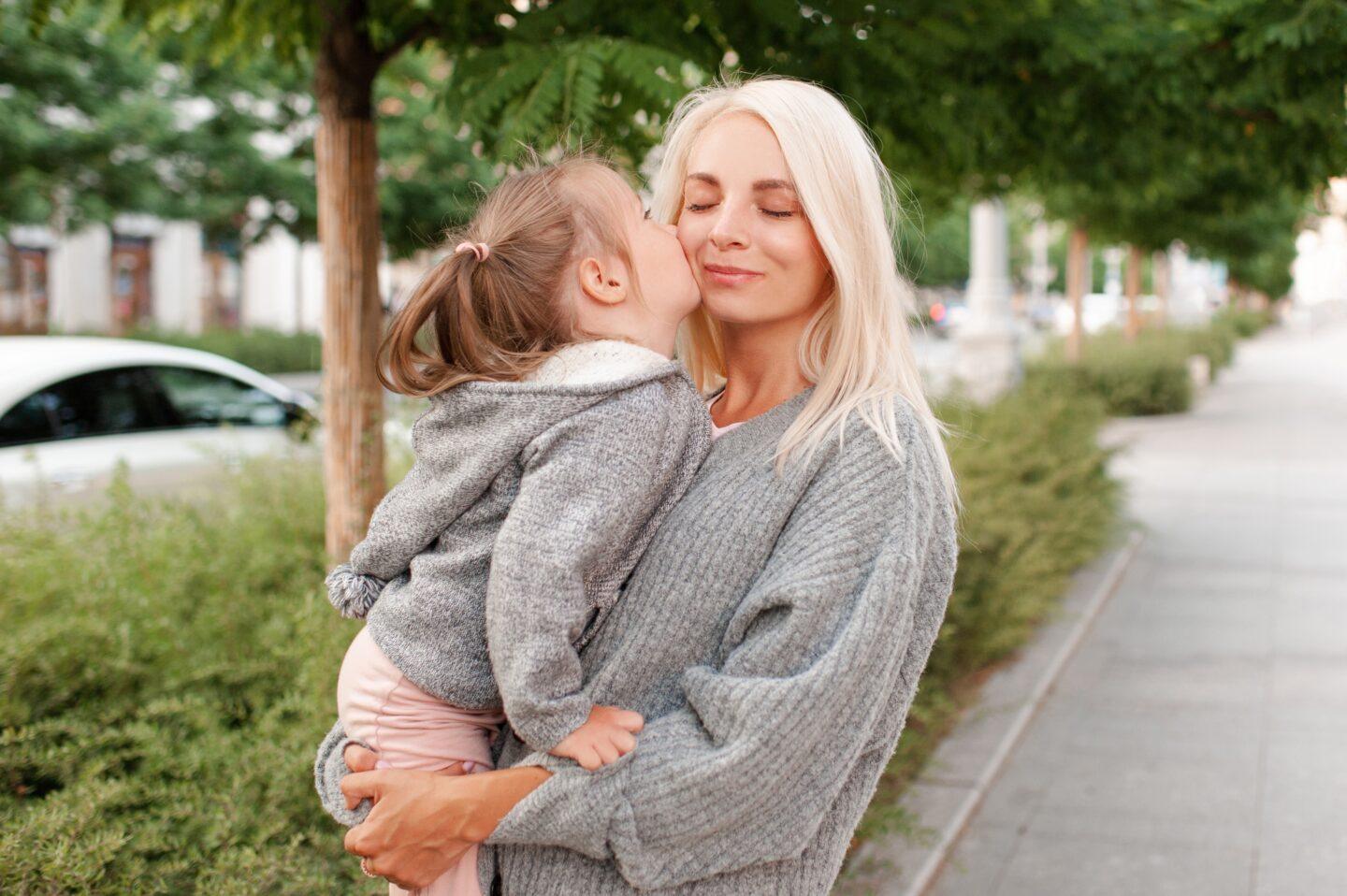 It’s Science: Sharing saliva shapes babies’ and toddlers’ understanding of close relationships sharing saliva: toddler kisses mom on cheek outside