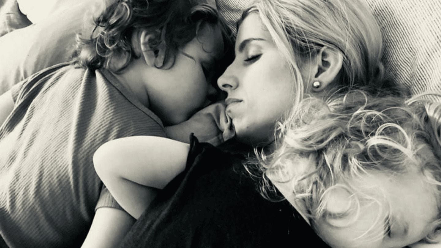 Motherhood is the longest time—and also the shortest time motherhood: mom sleeping with two young children