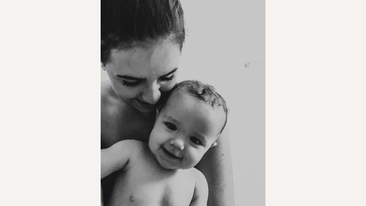 Dear Mama: Your babies need a happy mom, not a perfect one mama holding baby and smiling