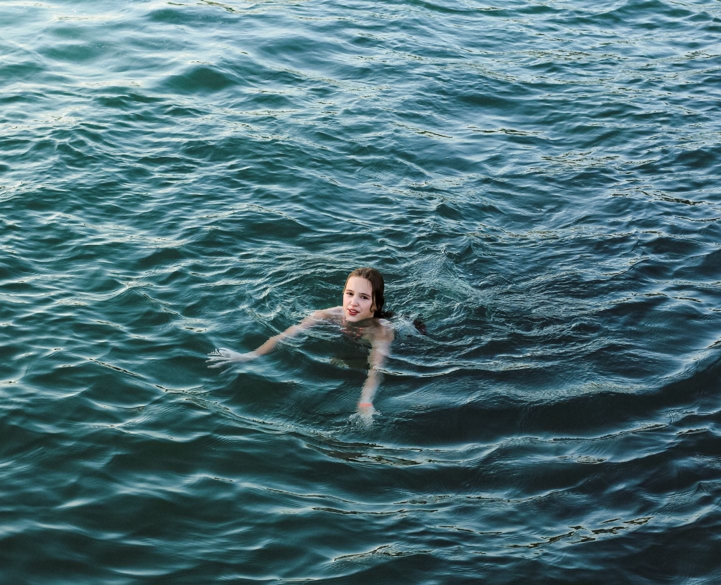 Teens are the second most at-risk age group for drowning teen drowning prevention: teen girl swimming in ocean