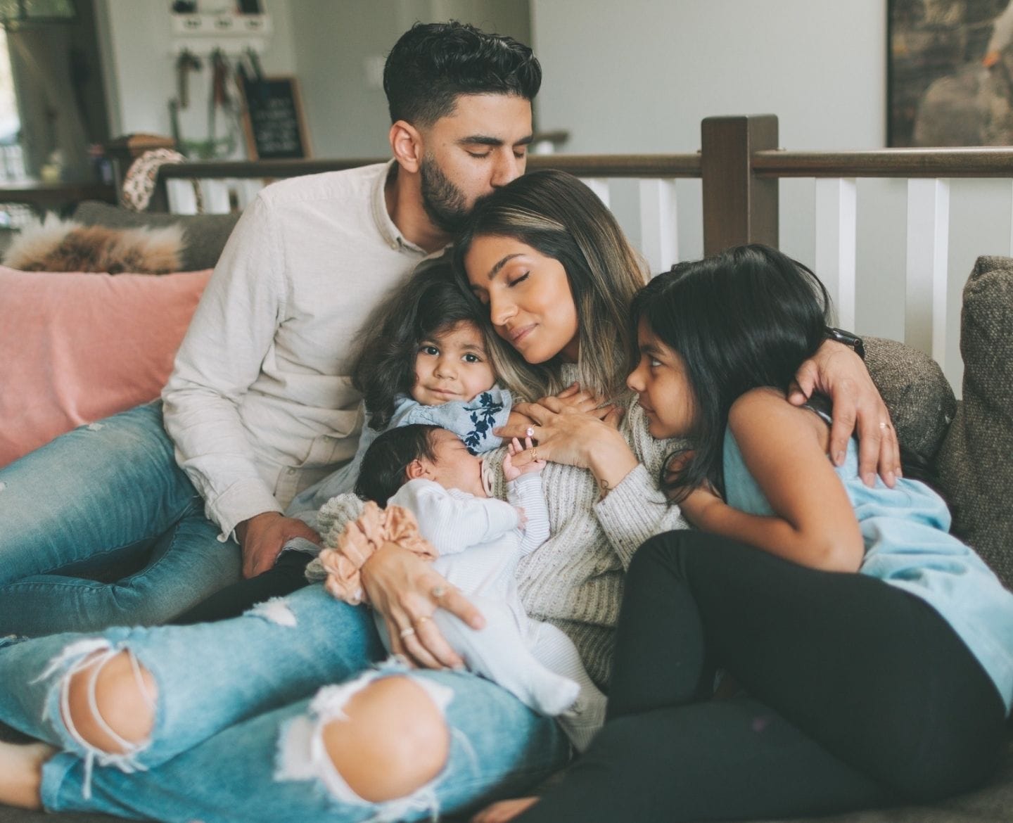 How to reclaim your identity after being a cancer caregiver family on the couch together