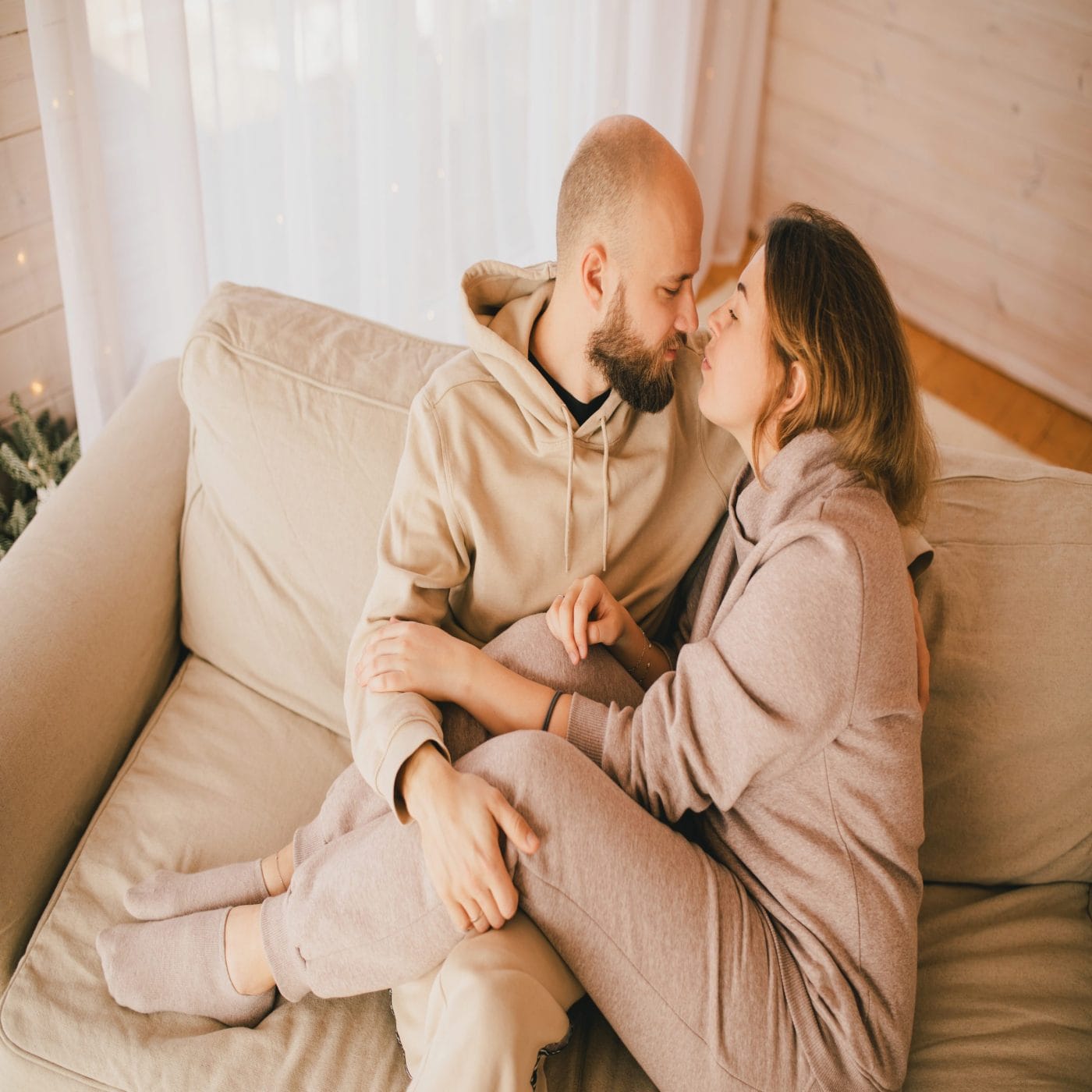 Dear Husband: Don’t forget that I am always on your team husband and wife sitting on couch