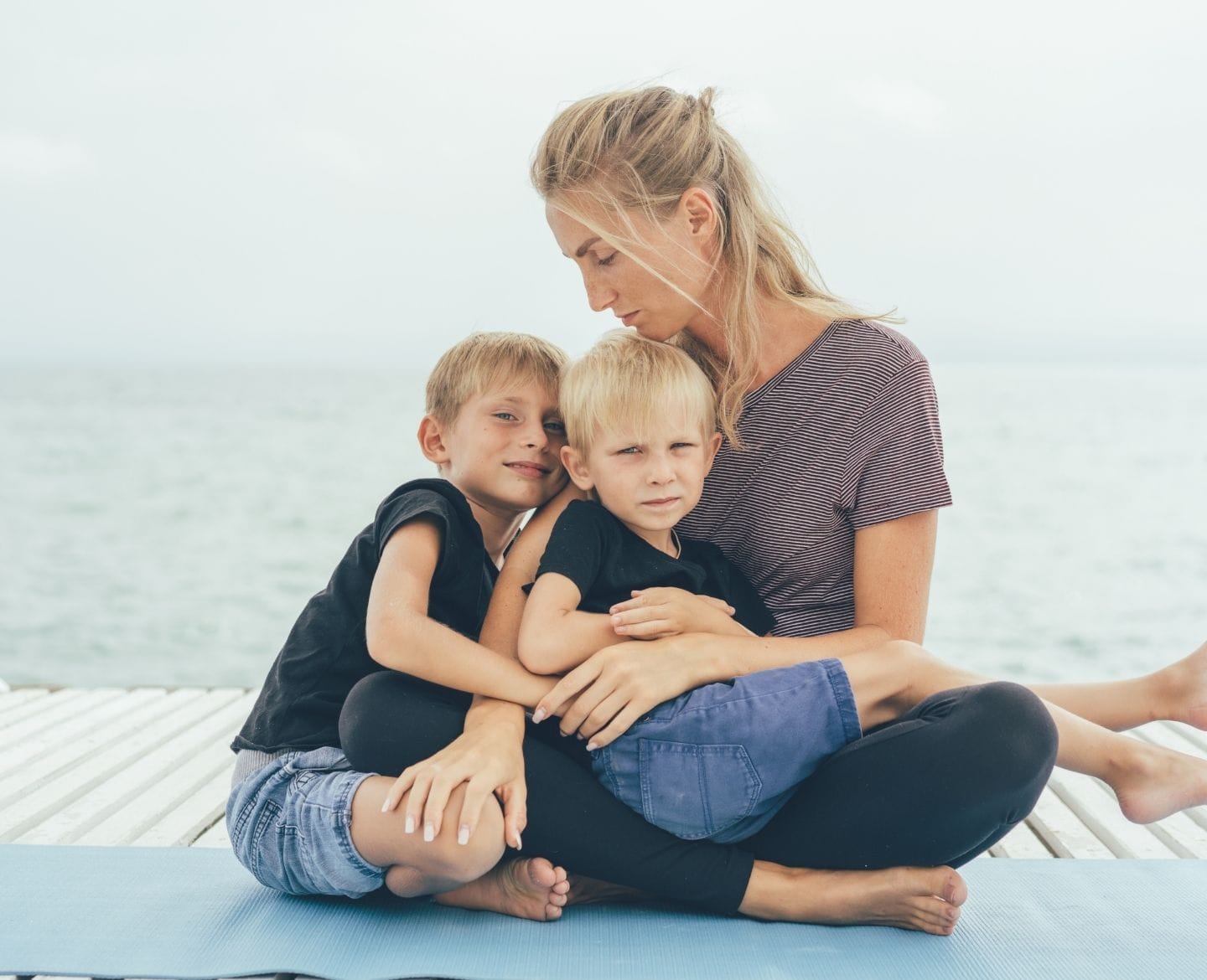 5 ways to help a sibling of a cancer patient feel important mom hugging boys