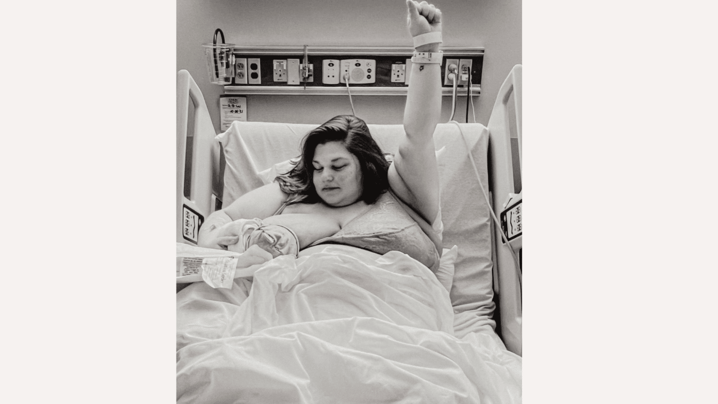 Why this photo is so much more than a breastfeeding photo breastfeeding photo: breastfeeding woman with fist in the air